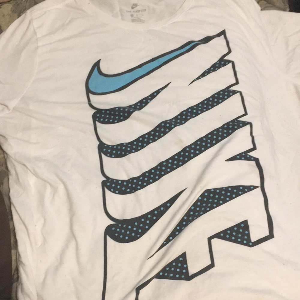 White Nike shirt